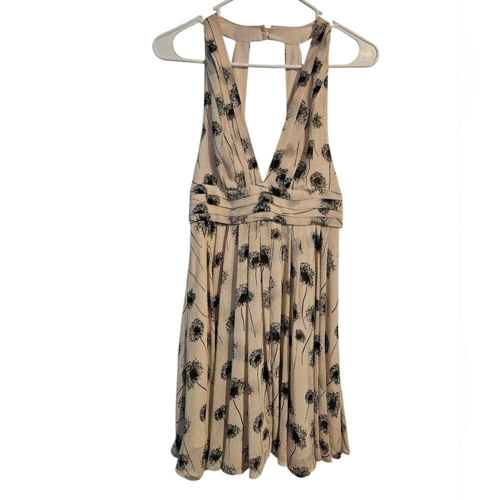 Woman's halter top mini dress with Dandelion pattern size 6